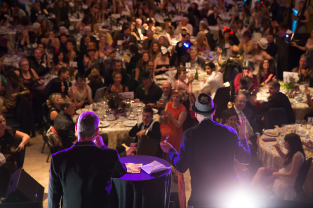 The exciting live auction at the Artumnal Gathering, 2013. Photo courtesy of Marco Sanchez (marcosanchez.net)